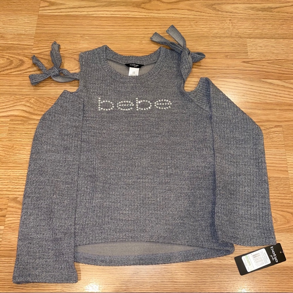 Brand new Bebe cut out sweater